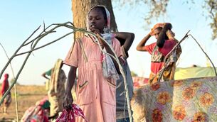 <p> Displaced Sudanese who fled El-Fasher after the city fell to the Rapid Support Forces rest near the town of Tawila in war-torn Sudan's western Darfur region. Picture: Getty Images</p> <p> Displaced Sudanese who fled El-Fasher after the city fell to the Rapid Support Forces rest near the town of Tawila in war-torn Sudan's western Darfur region. Picture: Getty Images</p>