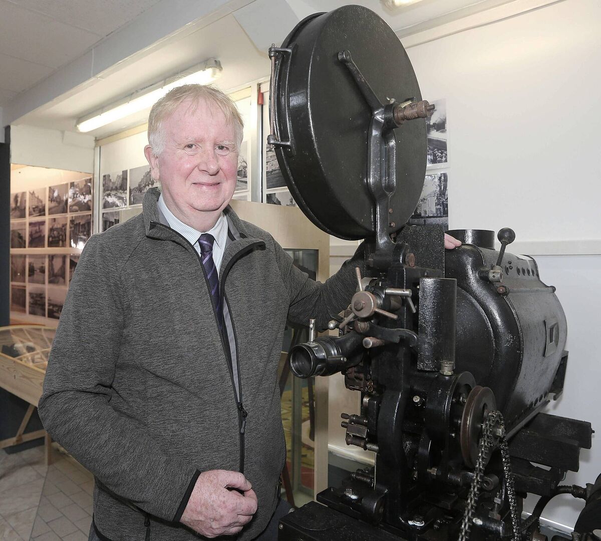 Ed Guiry, Museum Curator, with a 1924 cinematic projector, at the official opening of the Youghal Film and Photography Museum.