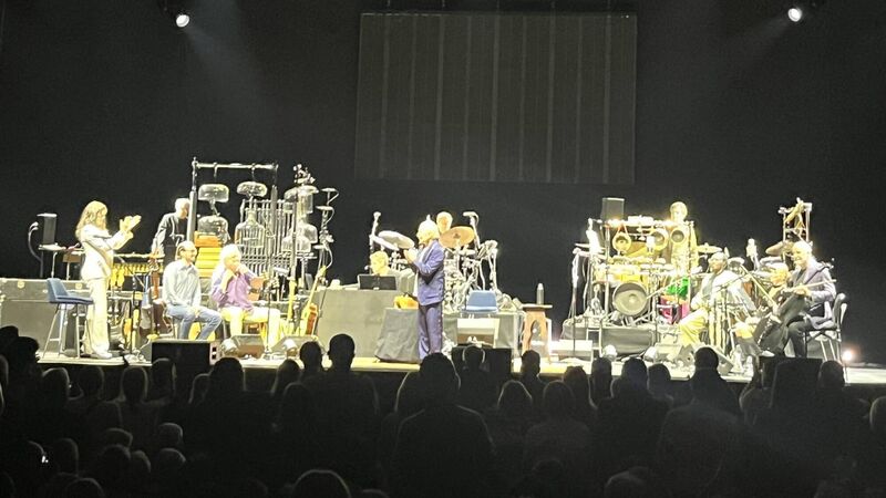 Paul Simon on stage at 3Arena in Dublin, with a band that included guest member Martin Hayes. Paul Simon on stage at 3Arena in Dublin, with a band that included guest member Martin Hayes.