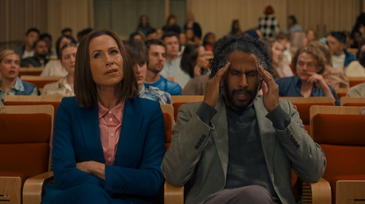 Minnie Driver as Dean Emily Watkinson and Prasanna Puwanarajah as Professor Westlake in Finding Emily. Picture: Focus Features. Minnie Driver as Dean Emily Watkinson and Prasanna Puwanarajah as Professor Westlake in Finding Emily. Picture: Focus Features.