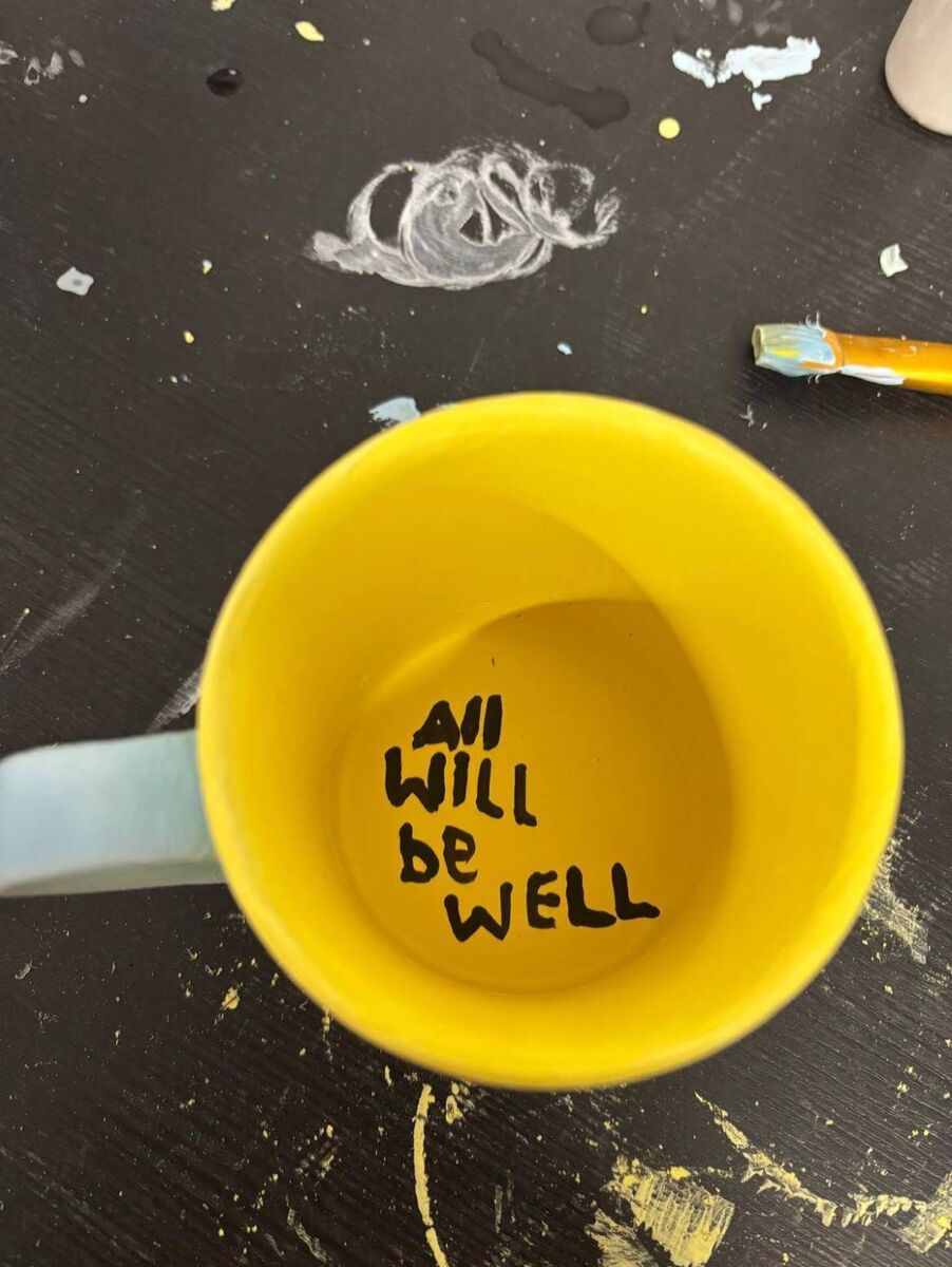 Ellen Cassidy's mug with the inscription "all will be well" Ellen Cassidy's mug with the inscription "all will be well"