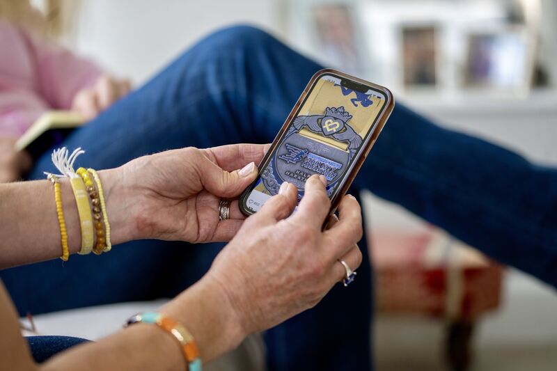 Violet Cassidy shows a preview of this year’s Cork City Marathon medal on her phone, specially designed in dedication to her daughter Ellen. Picture Chani Anderson Violet Cassidy shows a preview of this year’s Cork City Marathon medal on her phone, specially designed in dedication to her daughter Ellen. Picture Chani Anderson