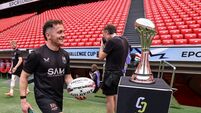 Michael Lowry walks past the European Rugby Challenge Cup trophy 21/5/2026