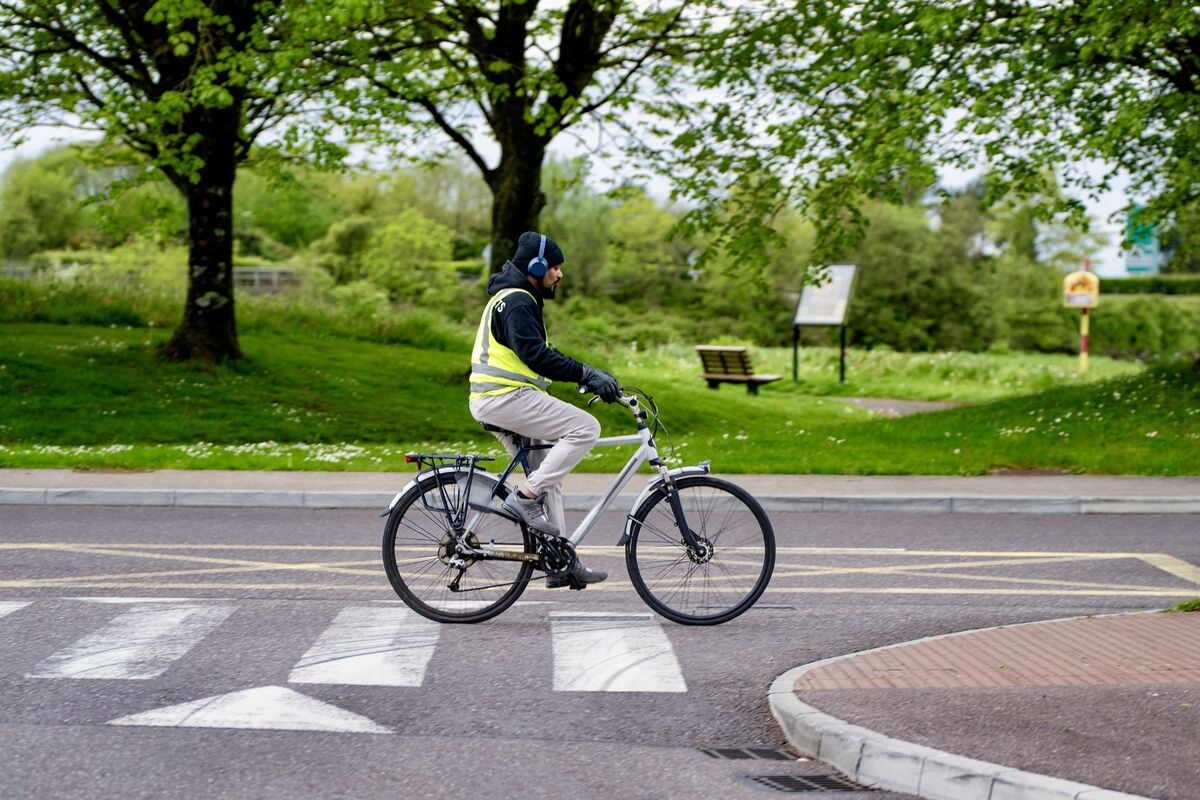 A commuter cycles along a dedicated pathway in Midleton, reflecting the town’s growing focus on sustainable transport and active travel infrastructure. Picture: Chani Anderson A commuter cycles along a dedicated pathway in Midleton, reflecting the town’s growing focus on sustainable transport and active travel infrastructure. Picture: Chani Anderson