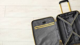 <p>Some recommend packing shoes and sandals in the space behind it to keep any dirt from the soles from transferring over to your holiday wardrobe.</p> <p>Some recommend packing shoes and sandals in the space behind it to keep any dirt from the soles from transferring over to your holiday wardrobe.</p>