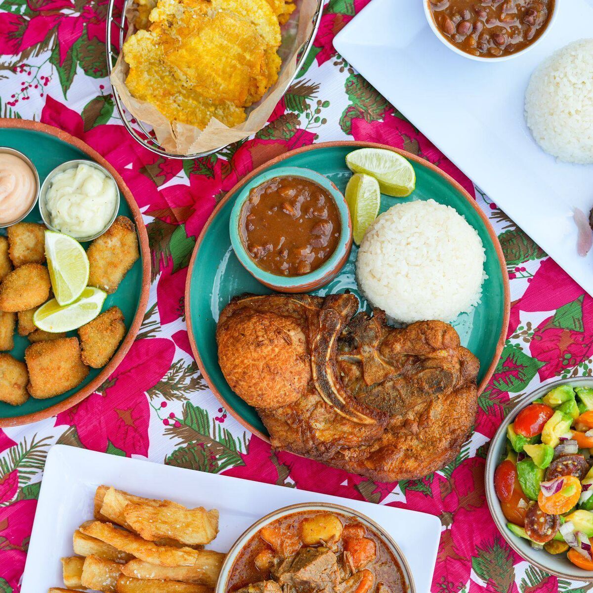 A spread of traditional dishes at La Alcapurris Quemá in San Juan, Puerto Rico A spread of traditional dishes at La Alcapurris Quemá in San Juan, Puerto Rico