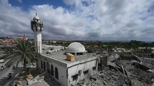 A damaged mosque is seen next of the destroyed Hezbollah paramedic centre, as Hezbollah and Israel trade attacks (Mohammed Zaatari/AP) A damaged mosque is seen next of the destroyed Hezbollah paramedic centre, as Hezbollah and Israel trade attacks (Mohammed Zaatari/AP)
