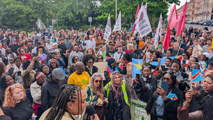 <p>A protest last Thursday outside Leinster House, Dublin, over the death of Congolese man Yves Sakila following an incident with security guards at a Dublin department store. Picture: Cillian Sherlock/PA</p>