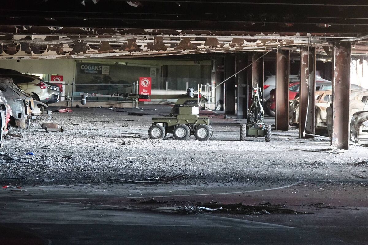 Two robotic probes operated by Reamda safely surveying damage in the car park of Douglas Village Shopping Centre, Cork, after it was devastated by fire in 2019.	Picture: Vrai.ie
                    