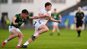 <p>AWAY: Kildare's Charlie Doran breaks free of the clutches of Meath's Harry McGuirk in their dramatic Leinster MFC final in Portlaoise. The Lilies wil now face Kerry in the quarter final of the All-Ireland with Meath playing Munster champions Cork. Pic: Tyler Miller/Sportsfile</p>