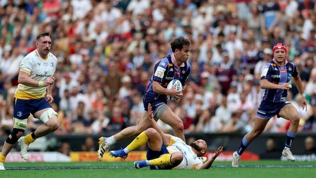 <p>ON THE CHARGE: Union Bordeaux Bègles' Damian Penaud capitalises on Leinster's Jamison Gibson-Park miss handling the ball during the 2026 Investec Champions Cup Final, San Mames Stadium, Bilbao. Pic: INPHO/James Crombie</p>