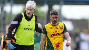 <p>BLOODIED: Ryan McHugh of Donegal with the team doctor at half time of the GAA All-Ireland Senior Football Championship Round 1, Fitzgerald Stadium, Killarney. Pic: INPHO/James Lawlor</p>