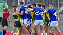 Ryan McHugh shows the referee his blooded face during a tussle 23/5/2026