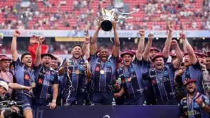 <p>MAGNIFIQUE: Union Bordeaux Bègles' Cameron Woki celebrates with the Champions Cup Trophy and teammates after the match. Pic: INPHO/James Crombie</p>