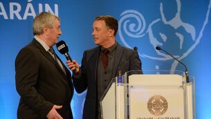 <p>THE KING: Frank McGuigan snr, speaks to Micheál Ó Domhnaill after the McGuigan family were presented with The Dermot Earley Family Award during the GAA President's Awards in 2017. Pic: Piaras Ó Mídheach/Sportsfile </p>