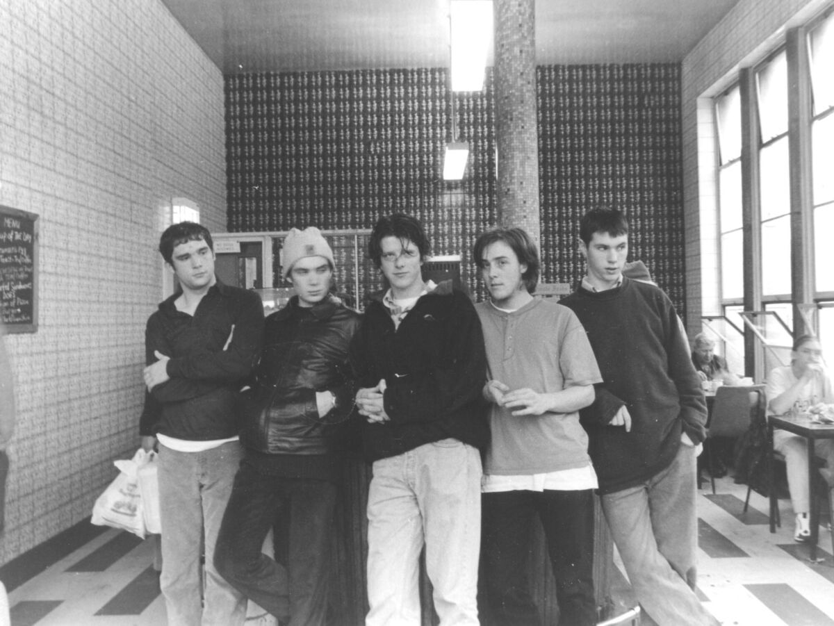  Cillian Murphy, second from left, and the other members of Sons Of Mr Green Genes in a publicity photograph taken at Cork's bus station in the 1990s. 