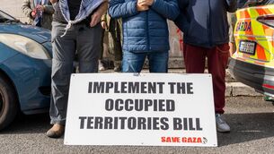 <p>A sign calling for the implementation of the Occupied Territories Bill at a protest outside Taoiseach Micheál Martin's Cork office last year. It has been thrown into sharp focus again after Irish activists were among many detained by Israeli forces while part of a Gaza-bound flotilla in the Mediterranean Sea. Picture: Noel Sweeney</p> <p>A sign calling for the implementation of the Occupied Territories Bill at a protest outside Taoiseach Micheál Martin's Cork office last year. It has been thrown into sharp focus again after Irish activists were among many detained by Israeli forces while part of a Gaza-bound flotilla in the Mediterranean Sea. Picture: Noel Sweeney</p>