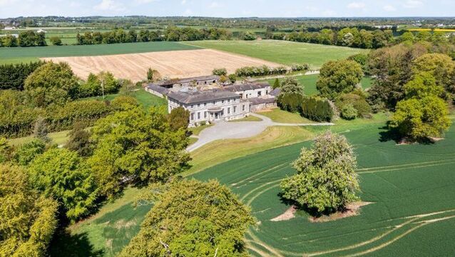 <p>'The house commands its elevated position with quiet confidence,' the selling agent says.</p>