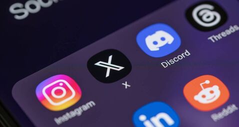 New social media apps formerly twitter  x and threads on smart phone screen