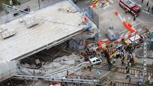 The overpass in Seoul had been undergoing demolition since August last year amid safety concerns (Choi Jae-gu/Yonhap via AP) The overpass in Seoul had been undergoing demolition since August last year amid safety concerns (Choi Jae-gu/Yonhap via AP)