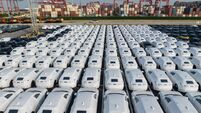 Electric vehicles bound for shipment at a port in China