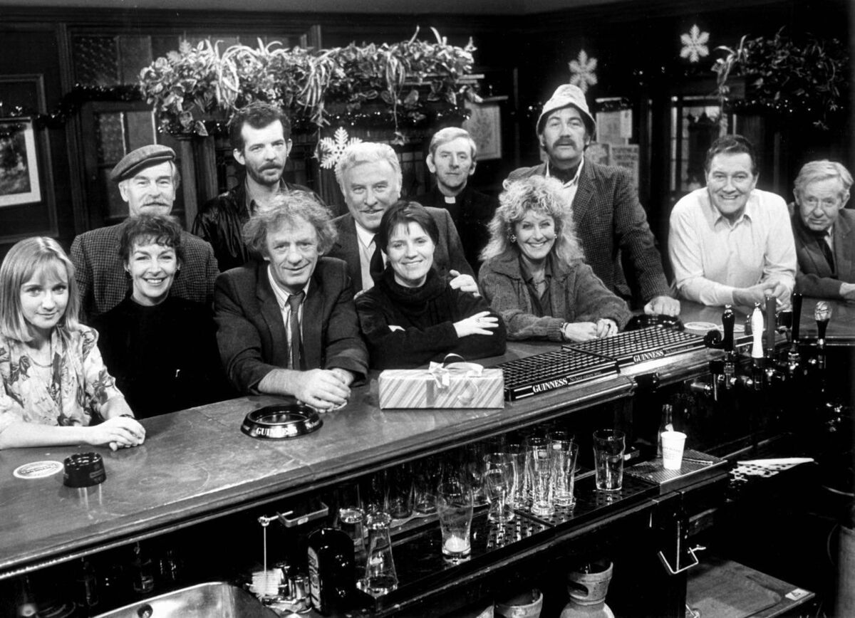 Christmas in Glenroe 1990, (left to right): Michelle (Isobel Mahon), Mary (Geraldine Plunkett), Stephen (Robert Carrickford), Miley (Mick Lally), Kevin (Liam Carney), Biddy (Mary McEvoy), Dinny (Joe Lynch), Shirley (Susan Slott), Fr. Devereaux (Donal Farmer), George (Alan Stanford), Mick (Gerry Sullivan) Christmas in Glenroe 1990, (left to right): Michelle (Isobel Mahon), Mary (Geraldine Plunkett), Stephen (Robert Carrickford), Miley (Mick Lally), Kevin (Liam Carney), Biddy (Mary McEvoy), Dinny (Joe Lynch), Shirley (Susan Slott), Fr. Devereaux (Donal Farmer), George (Alan Stanford), Mick (Gerry Sullivan)