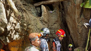 Rescuers work to reach seven people who have been trapped in a cave in Xaisomboun province, Laos (Metta Tham Rescue Kalasin/AP) Rescuers work to reach seven people who have been trapped in a cave in Xaisomboun province, Laos (Metta Tham Rescue Kalasin/AP)