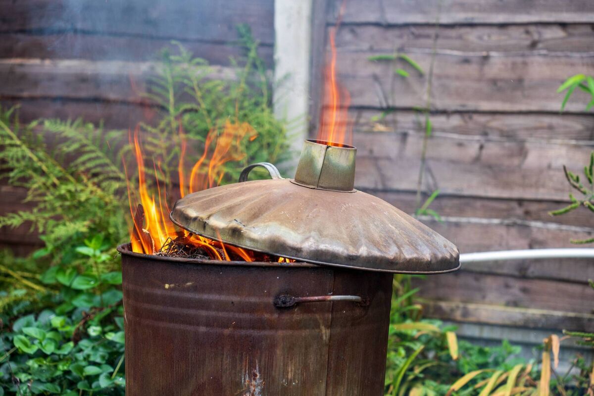 Backyard burning of domestic waste, treated wood and garden waste using a mini-incinerator or open bonfire is illegal in Ireland. File picture Backyard burning of domestic waste, treated wood and garden waste using a mini-incinerator or open bonfire is illegal in Ireland. File picture