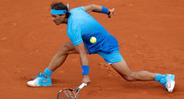 Rafael Nadal and Novak Djokovic advance at French Open