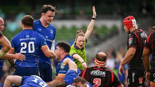 <p>Referee Hollie Davidson signals for Leinster's second try scored by Thomas Clarkson during the United Rugby Championship match at the Aviva Stadium. Pic: David Fitzgerald/Sportsfile</p>