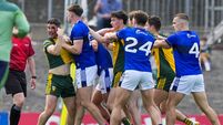 Ryan McHugh shows the referee his blooded face during a tussle 23/5/2026