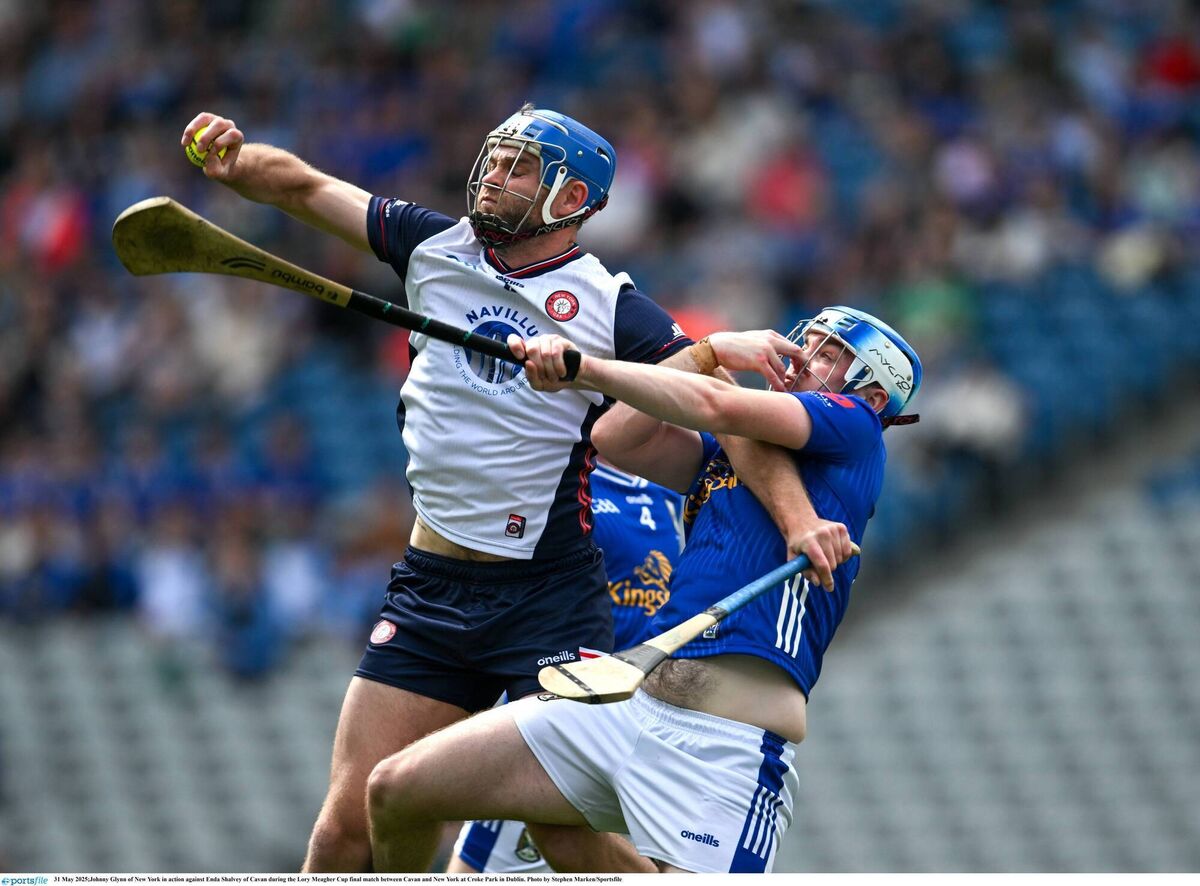 Johnny Glynn of New York in action against Enda Shalvey of Cavan during the 2025 Lory Meagher Cup final. Pic: Stephen Marken/Sportsfile
