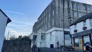 <p>The Grand Hotel: Local independent senator Joe Conway previously described the hotel as a 'hulking carbuncle' that has blighted the landscape of the idyllic tourist town.</p> <p>The Grand Hotel: Local independent senator Joe Conway previously described the hotel as a 'hulking carbuncle' that has blighted the landscape of the idyllic tourist town.</p>