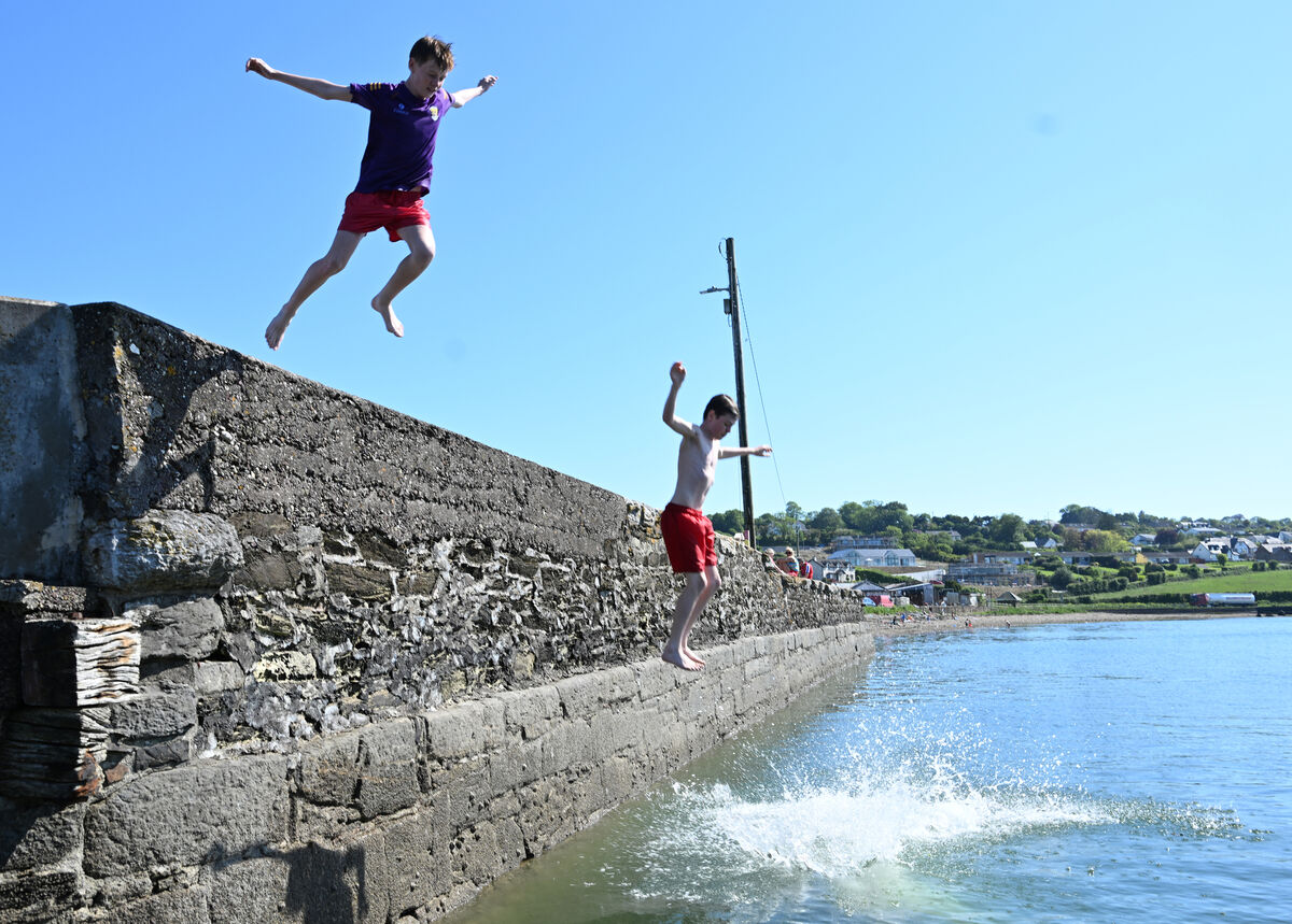 Making a splash ahead of the thunder crash: Ronan Lorcan making the most of the sunny weather and high temperatures at Aghada Pier, Co Cork, ahead of the arrival of thunder showers on Wednesday. Picture: Larry Cummins Making a splash ahead of the thunder crash: Ronan Lorcan making the most of the sunny weather and high temperatures at Aghada Pier, Co Cork, ahead of the arrival of thunder showers on Wednesday. Picture: Larry Cummins