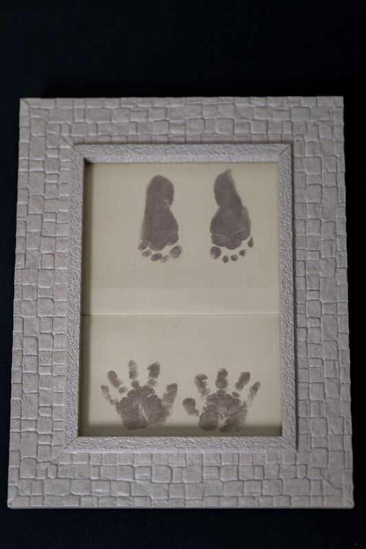 The imprints of Alma’s hands and feet, treasured keepsakes from the short time Daniela Gomez and Daniel Brenes shared with her following her birth in January. Picture: Chani Anderson The imprints of Alma’s hands and feet, treasured keepsakes from the short time Daniela Gomez and Daniel Brenes shared with her following her birth in January. Picture: Chani Anderson