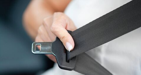 Hand pulling seat belt
