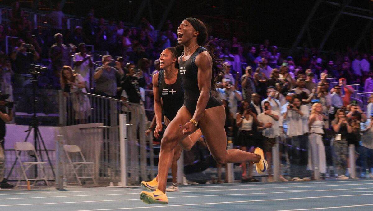 Barbadian sprinter Tristan Evelyn, right, runs next to US sprinter Taylor Anderson as she wins the women's 100m during the Enhanced Games. Barbadian sprinter Tristan Evelyn, right, runs next to US sprinter Taylor Anderson as she wins the women's 100m during the Enhanced Games.