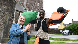 <p> Chris Amour completes his 300km run from Dublin to Cork in aid of Pieta House, and is congratulated at the finish of his fundraising event by Rev Meghan Farr at the Church of St Anne, Shandon, Cork. Chris marked the end of his run by playing the hymn Bind Us Together on the famous shandon bells. Picture; Larry Cummins</p>