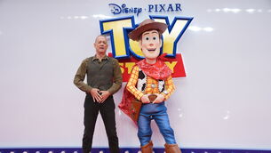 <p>Tom Hanks (left) and Toy Story character Woody (Yui Mok/PA)</p> <p>Tom Hanks (left) and Toy Story character Woody (Yui Mok/PA)</p>