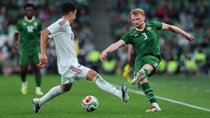 <p>Ireland’s Liam Scales with Ayoub Al-Oui of Qatar. Pic: Ryan Byrne/Inpho</p>