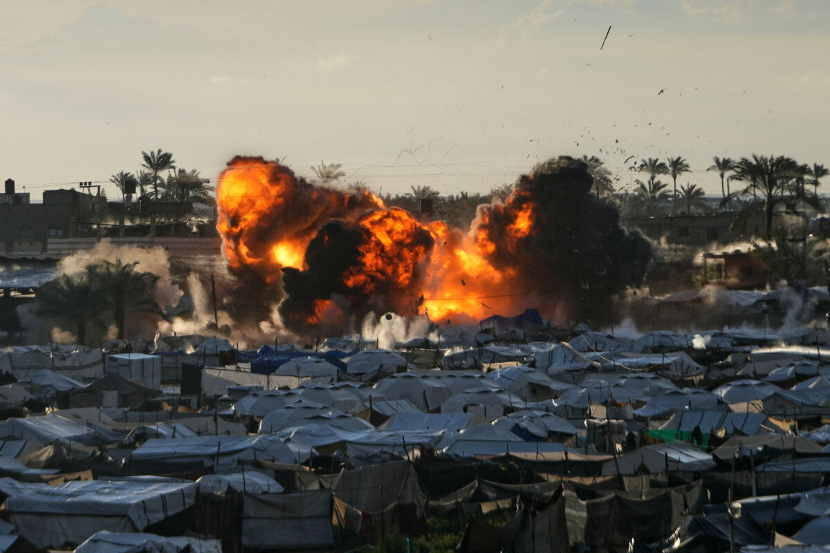 Smoke and flames rise from an Israeli military strike on a target next to a tent camp in Deir al-Balah, central Gaza Strip, Wednesday, March, 25, 2026. (AP Photo/Abdel Kareem Hana) Smoke and flames rise from an Israeli military strike on a target next to a tent camp in Deir al-Balah, central Gaza Strip, Wednesday, March, 25, 2026. (AP Photo/Abdel Kareem Hana)