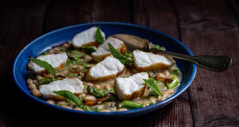 Aishling Moore: How to make monkfish with haricot bean, pea, and guanciale stew