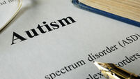 Autism spectrum disorder ASD written on a paper.