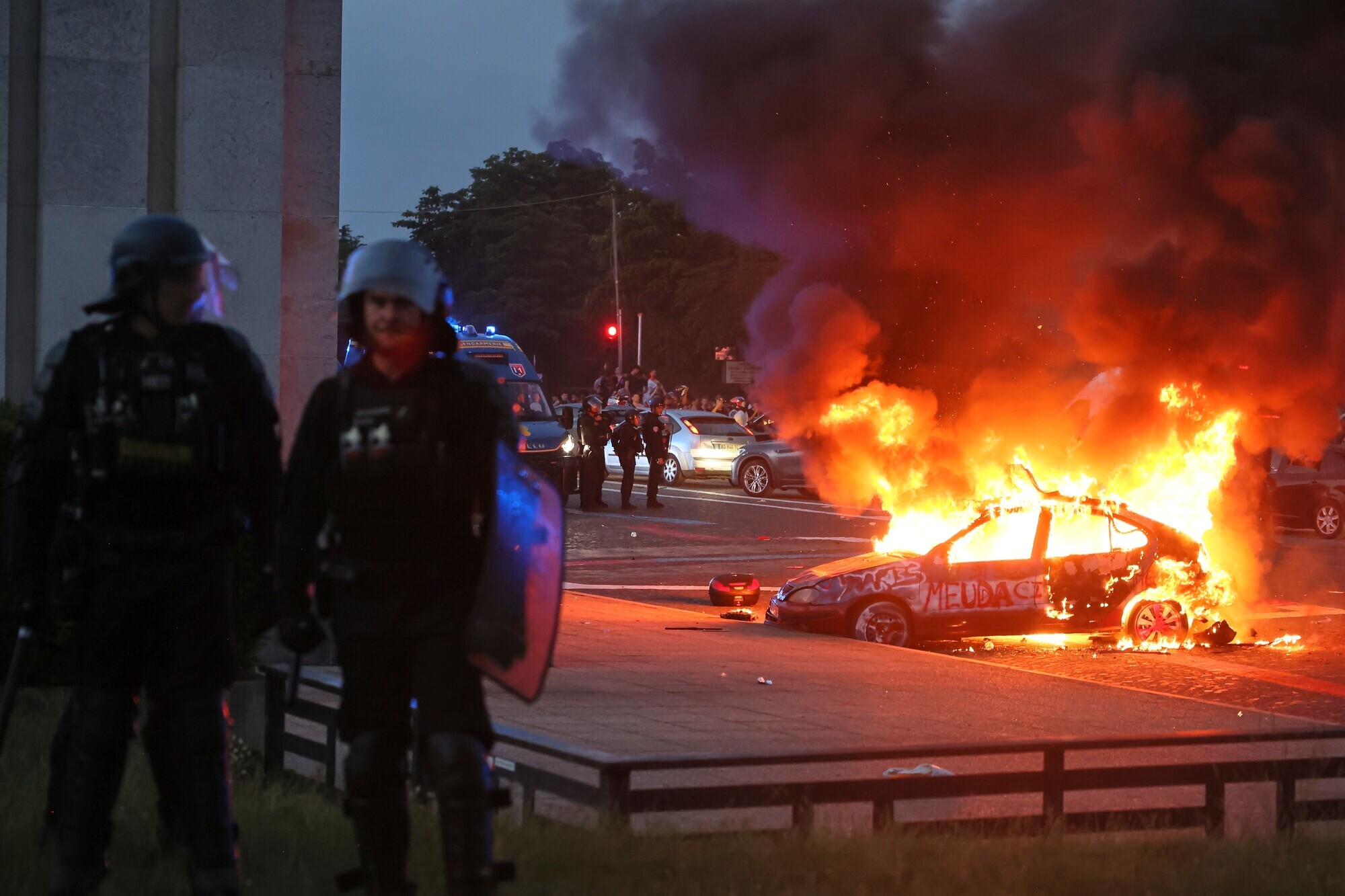 French police arrest more than 400 as PSG fans celebrate Champions League win over Arsenal