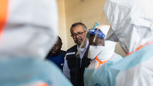 WHO director-general Tedros Adhanom Ghebreyesus visits health workers at the Evangelical Medical Centre (CEM) in Bunia, DR Congo (Moses Sawasawa/AP)