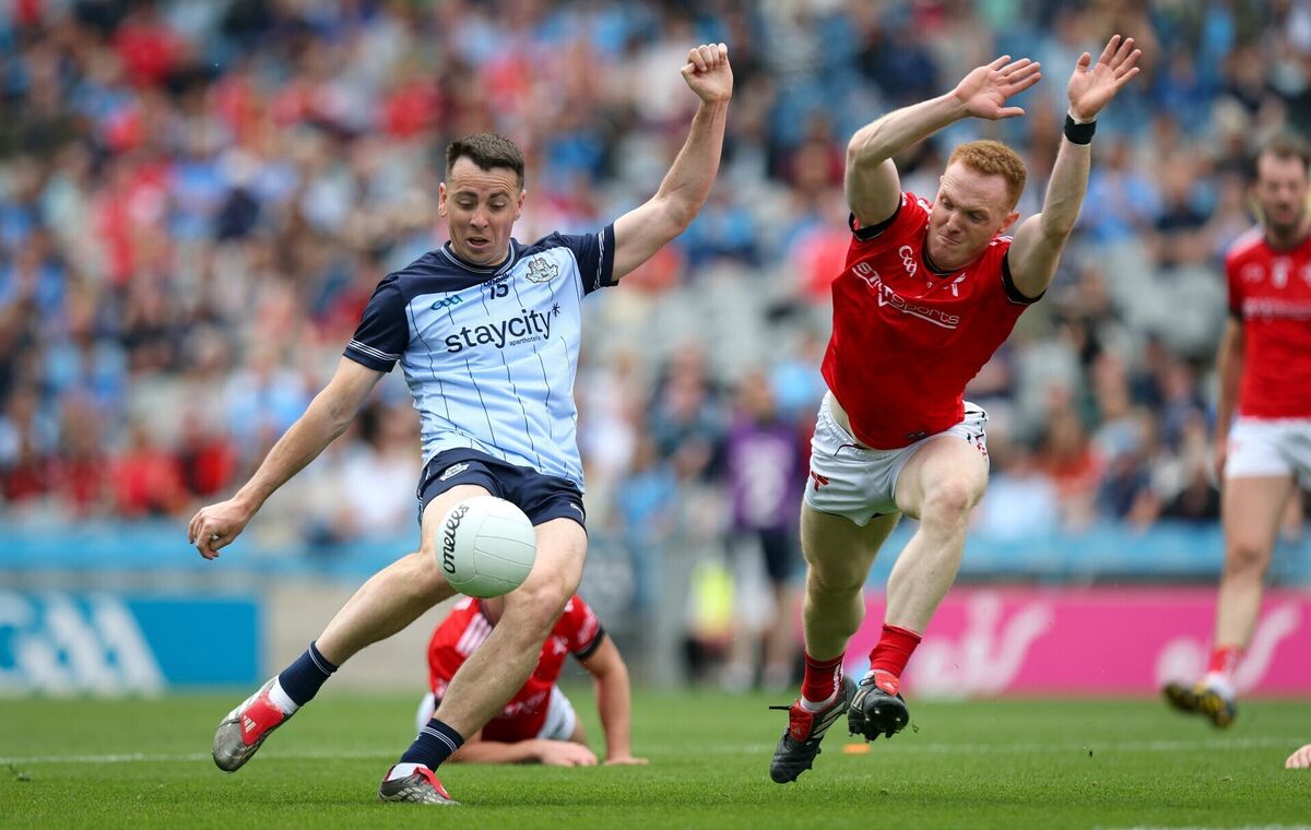Louth's Donal McKenny dives to block a shot by Dublin's Cormac Costello. Pic: ©INPHO/Ryan Byrne