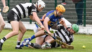 <p>BATTLE: Midleton's Carthaigh Cronin and Luke Dineen tussle with Carrigtwohill's Liam O'Sullivan during their SHL clash. Pic: David Keane.</p>
