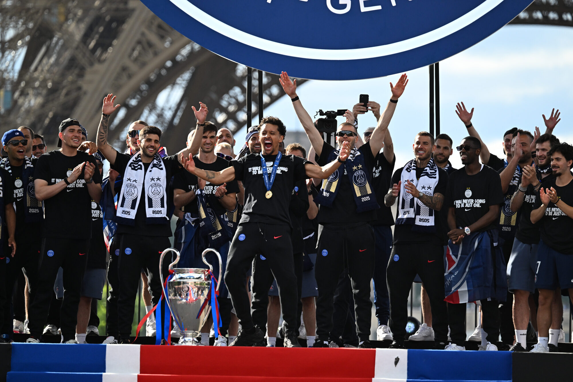 French capital hosts PSG parade after clashes marred Champions League win