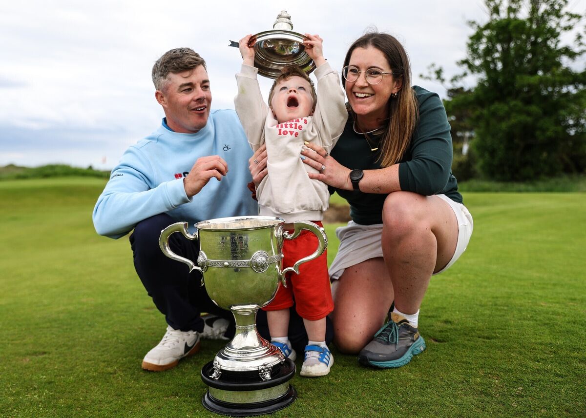 Stuart Grehan with his wife Carla and their son Kai celebrate with the East of Ireland Men's Amateur Open Championship trophy Stuart Grehan with his wife Carla and their son Kai celebrate with the East of Ireland Men's Amateur Open Championship trophy