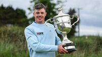 Inpho Stuart Grehan with the East of Ireland Men's Amateur Open Championship trophy after winning 31/5/2026